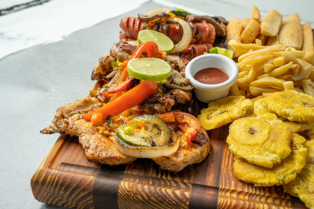 a-plate-of-food-that-includes-chicken-potatoes-and-vegetables-lahq2ydd-t8