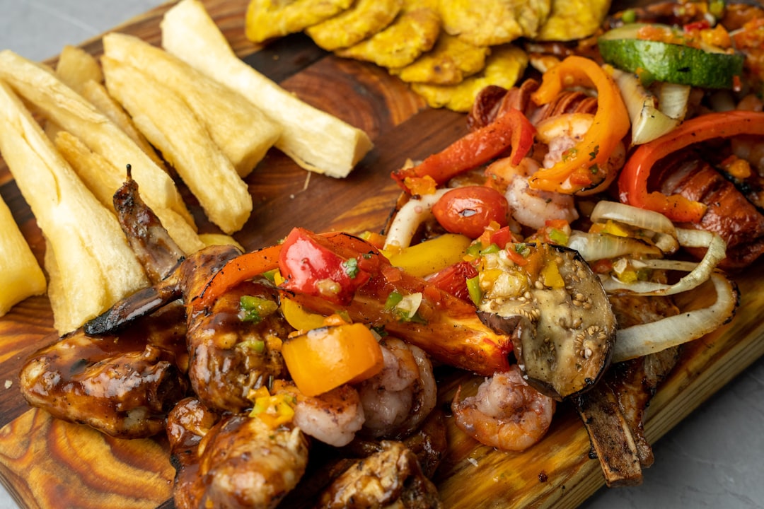 a-wooden-cutting-board-topped-with-different-types-of-food-hao8q859tqo
