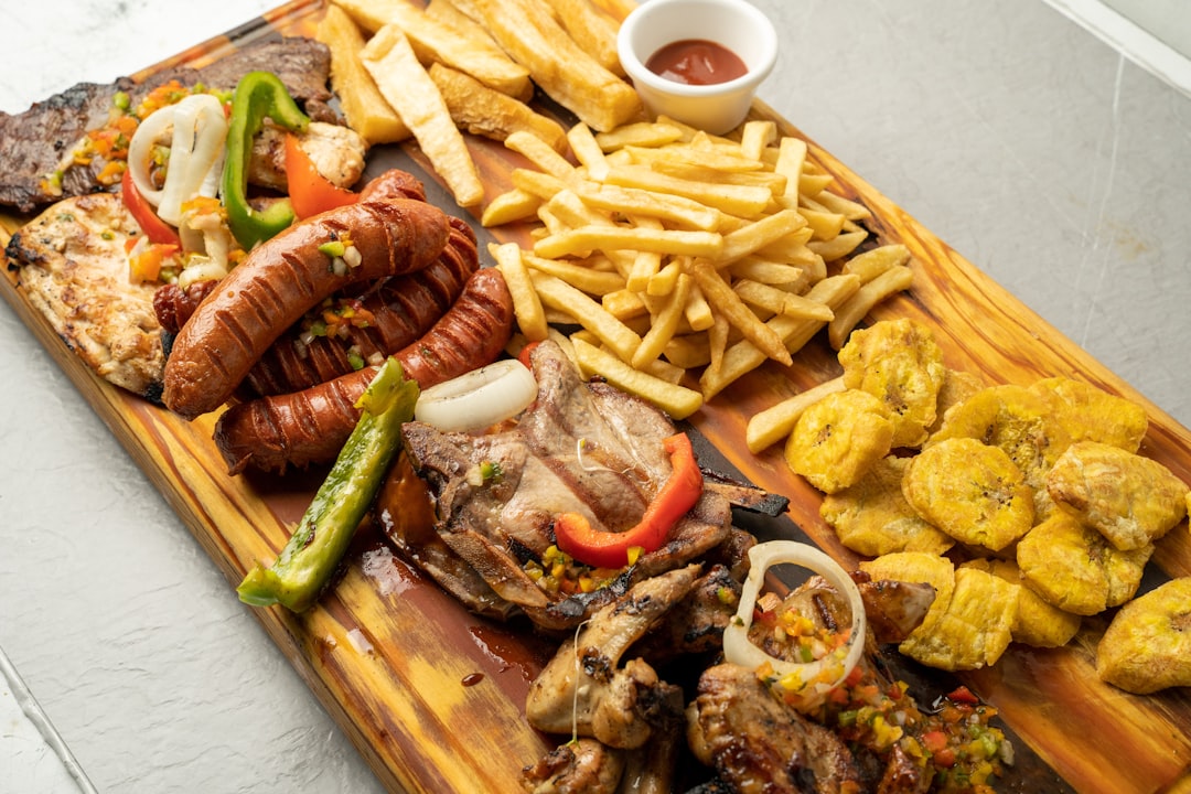 a-wooden-cutting-board-topped-with-lots-of-food-nw5t7hih-g