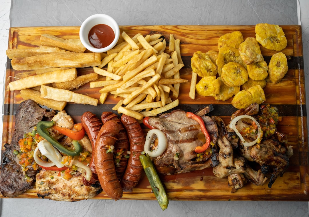 a-wooden-tray-topped-with-lots-of-different-types-of-food-y6hprdhdsmu